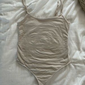 Super soft seamless body suit in taupe